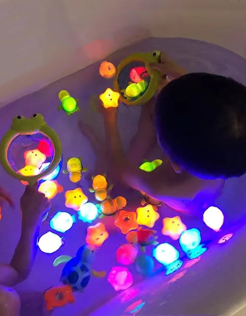 Load image into Gallery viewer, Baby Bath Toys Bathtub LED Light up Toys Colorful Changing Waterproof Underwater Lights Bath Toys for Boys Girls Birthday Gift
